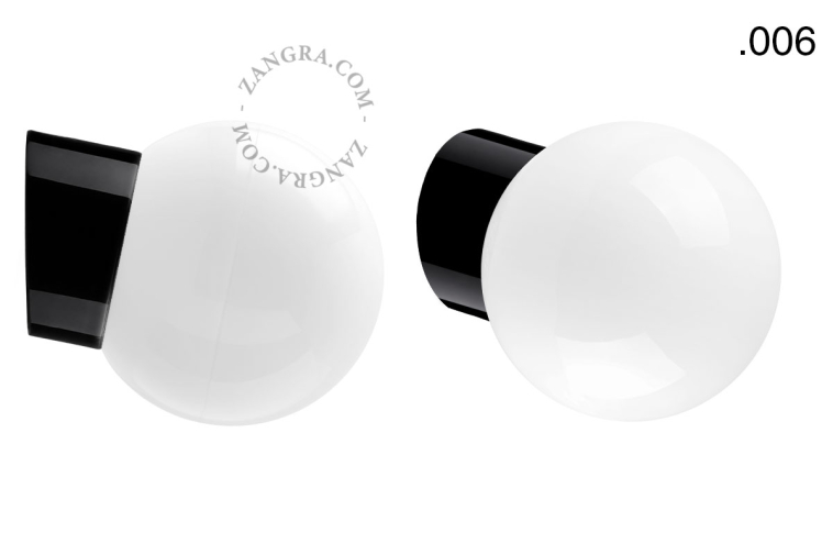 Black porcelain wall light with glass lampshade.