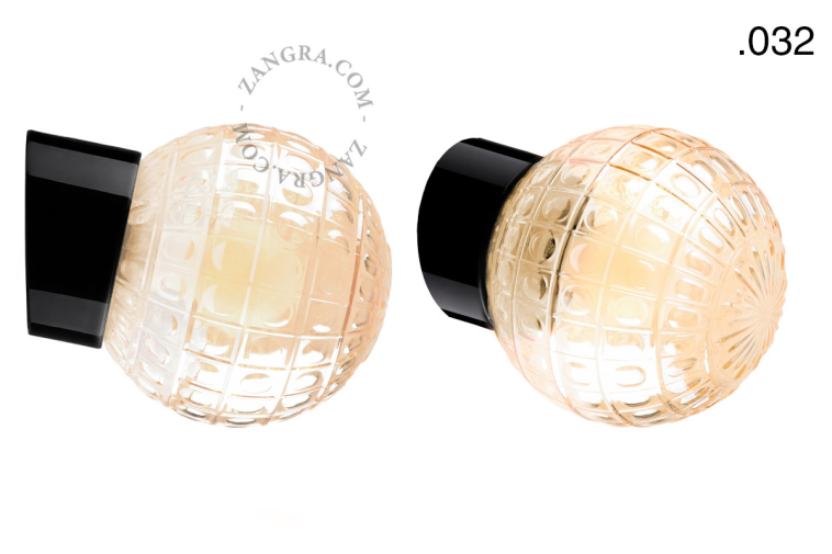 Black porcelain wall light with glass lampshade.