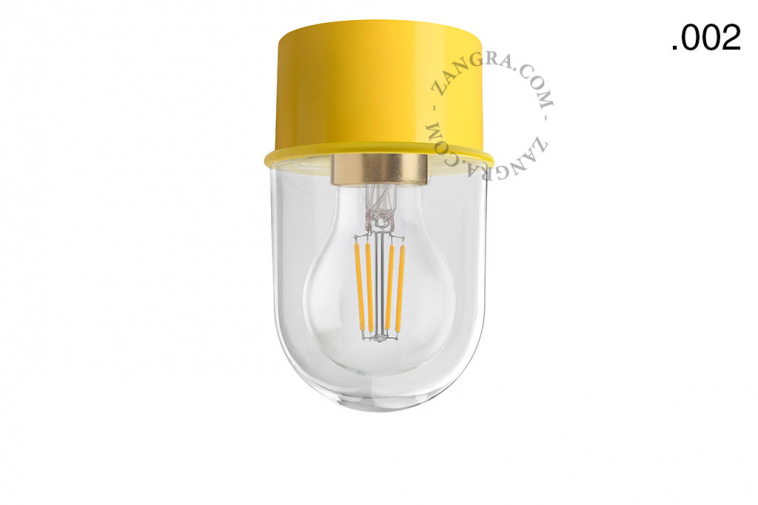 yellow ceiling light with glass shade