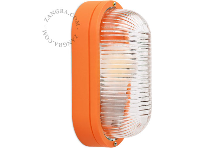 Oval orange bulkhead light.