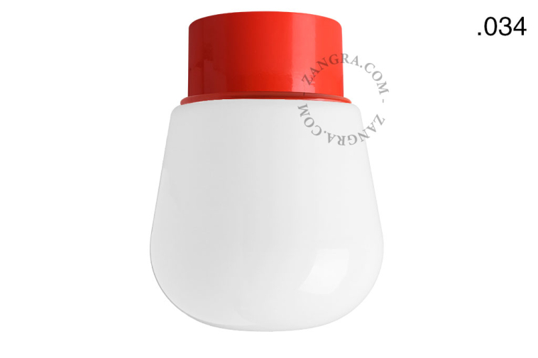Red ceiling light with glass shade.