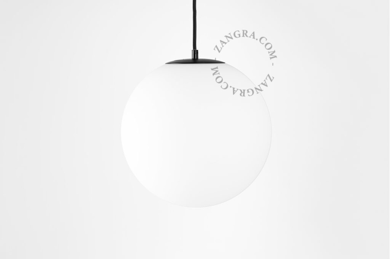 Pendant light with frosted glass lampshade.