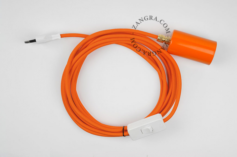 Orange plug-in pendant light with switch and plug.