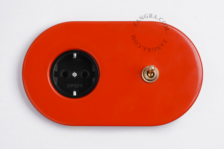 enchufe rojo e interruptor simple o conmutado - palanca de latón