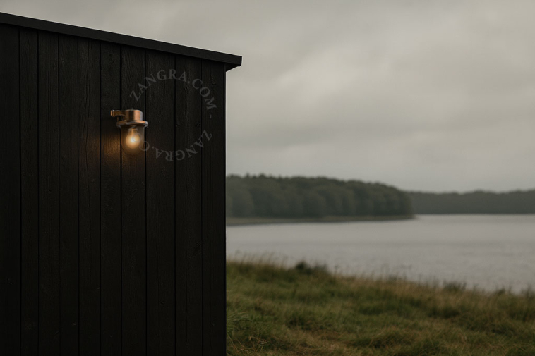 Outdoor brass wall light.