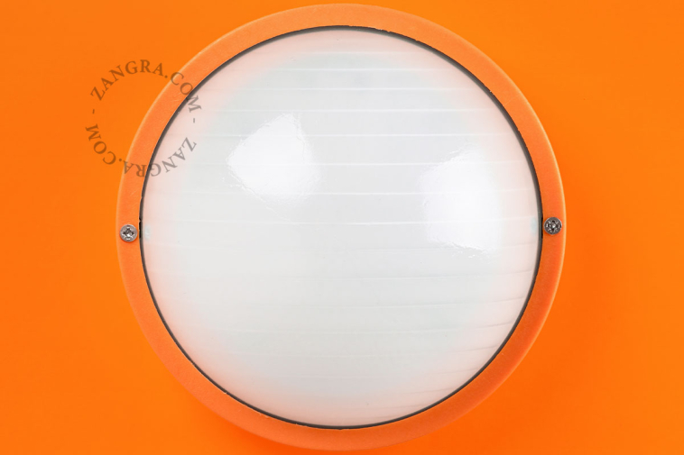 Round orange bulkhead light.