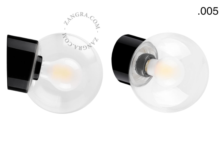 Black porcelain wall light with glass lampshade.