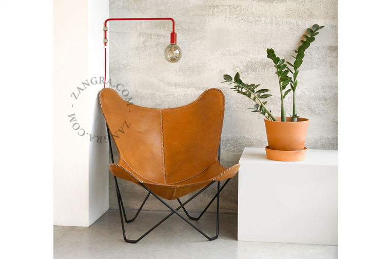 red wall lamp with swing arm