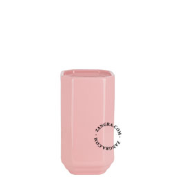 Pink porcelain toilet brush holder.