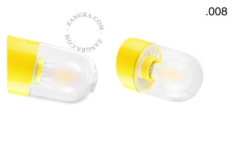 Yellow porcelain wall light with glass lampshade.