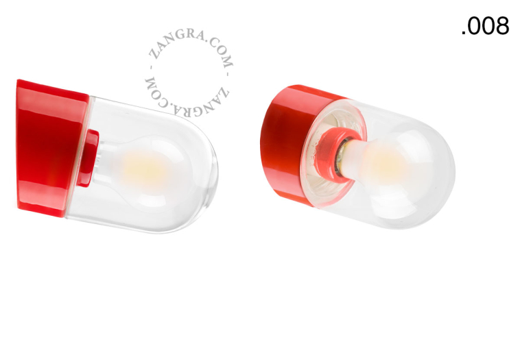 Red porcelain wall light with glass lampshade.