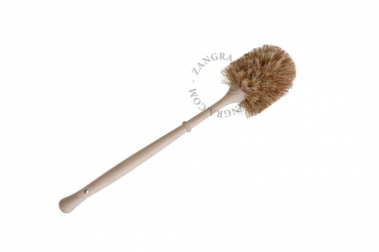 Porte-balayette en forme de chat en porcelaine avec sa brosse en bois.