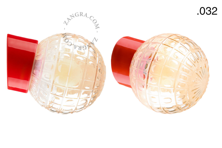 Red porcelain wall light with glass lampshade.