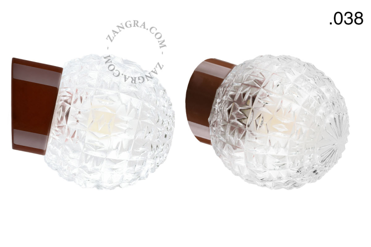 Brown porcelain wall light with glass lampshade.