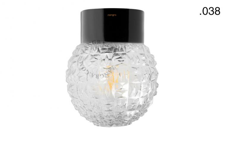 Lampe en porcelaine noire avec globe en verre.