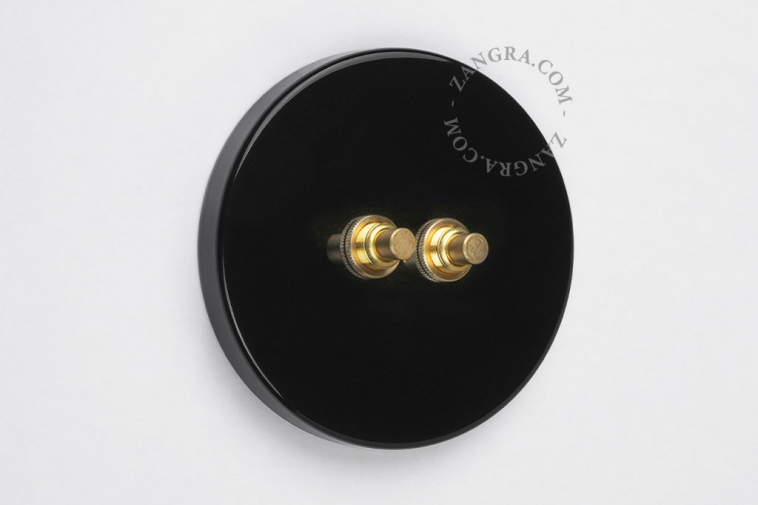 interrupteur double noir avec 2 boutons poussoirs en laiton brut couleur or