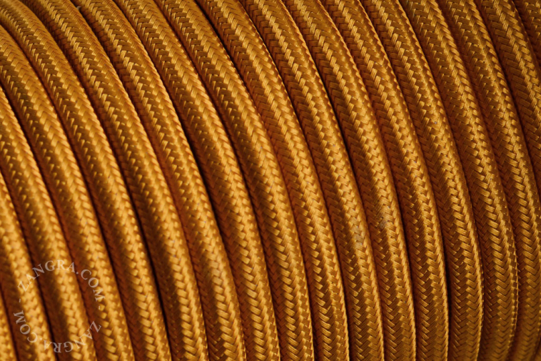 Dark golden fabric cable.