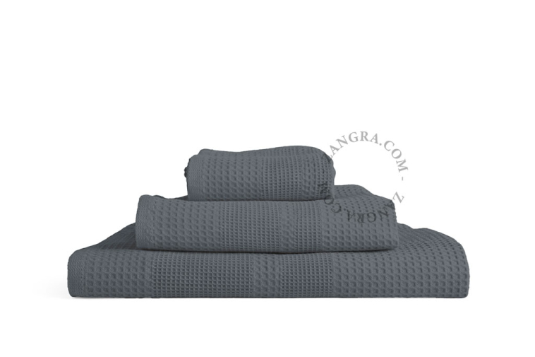 Dark grey honeycomb bath towel.