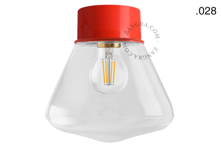 Lámpara roja retro con pantalla de cristal.