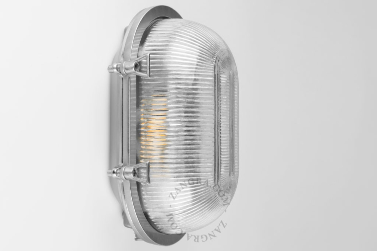 Nickel-plated bulkhead light with prismatic glass.