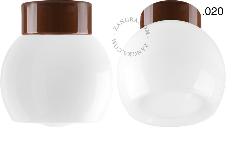 Lampe ronde en porcelaine marron.