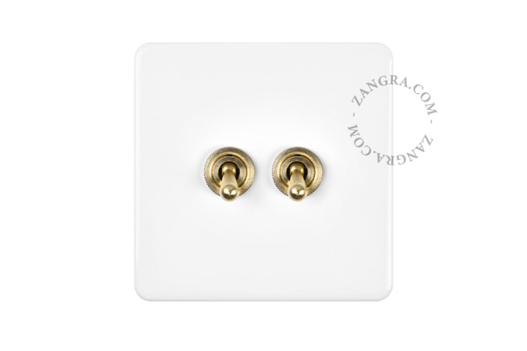 White porcelain square-shaped switch.