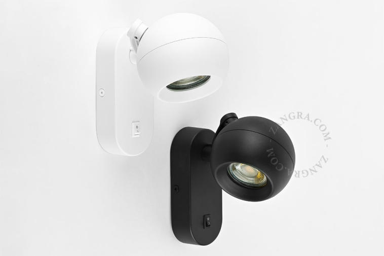 Bedside reading lamp with light switch.