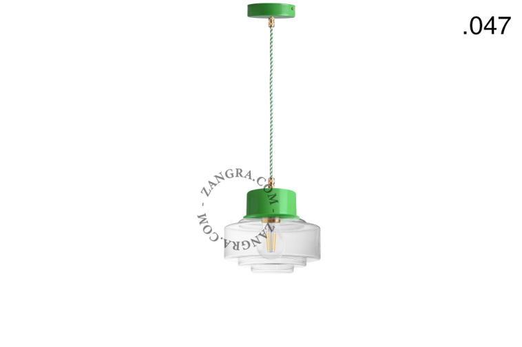 Green pendant light with glass shade.