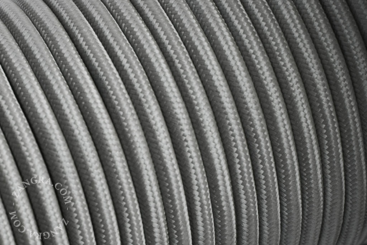 Grey fabric cable.