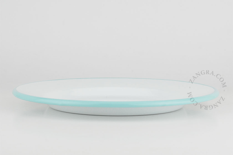 White enamel plate with light blue rim.
