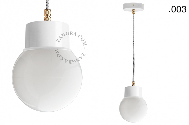 White pendant light with glass shade.