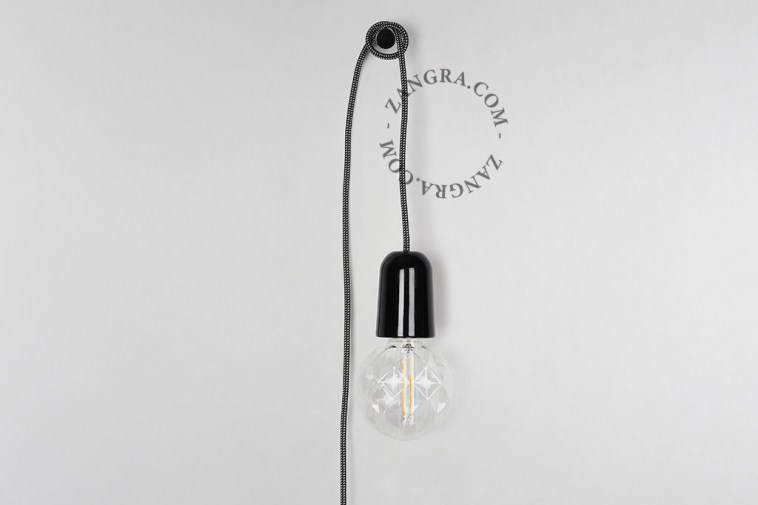 Black porcelain plug-in pendant light with switch.