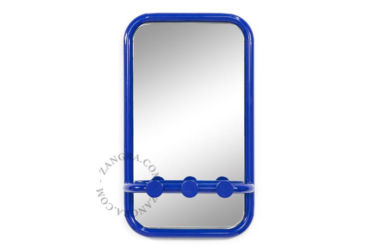 Retro mirror with three hooks.