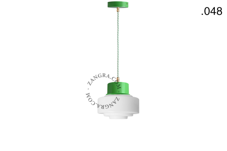 Green pendant light with glass shade.