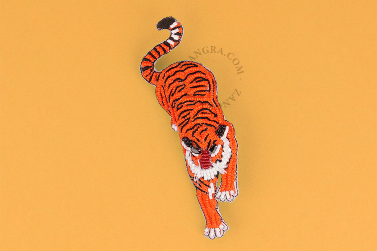 Tiger brooch.