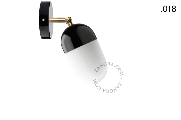 Black porcelain adjustable wall light with glass shade.