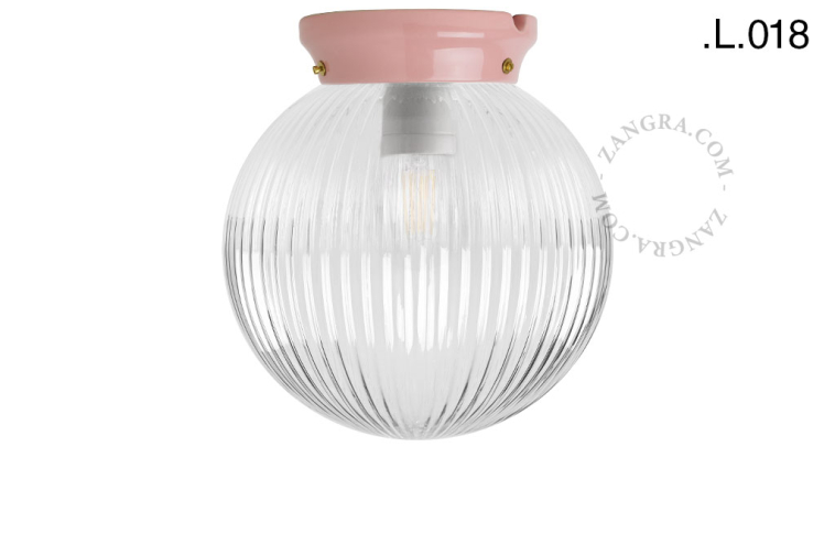 Pink porcelain Art Deco light with glass shade.