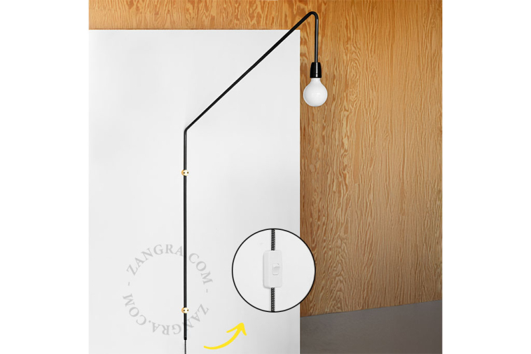 Wall light with swivelling arm.