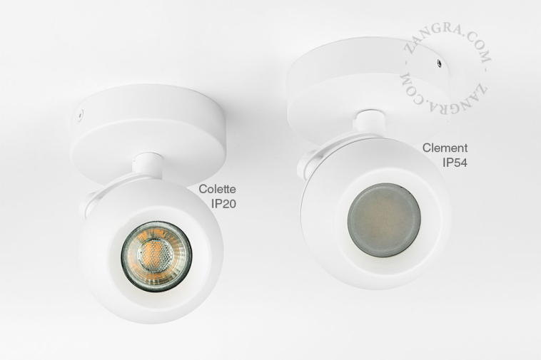 Surface-mounted adjustable LED spotlight for outdoor lighting.