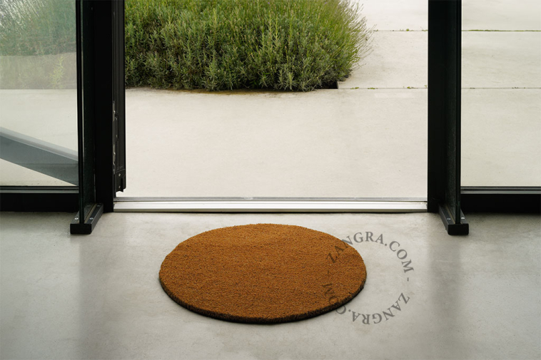 Round coir doormat.