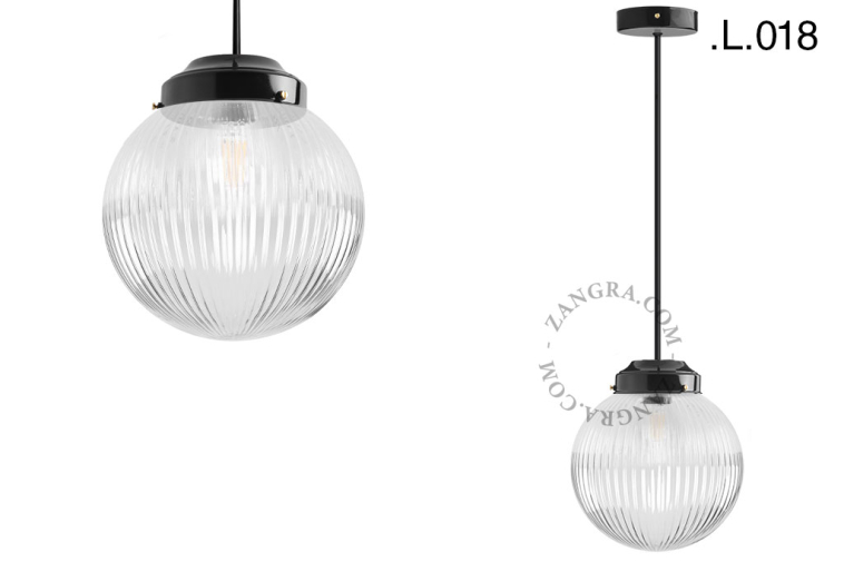 Black retro pendant light schoolhouse style with glass shade.