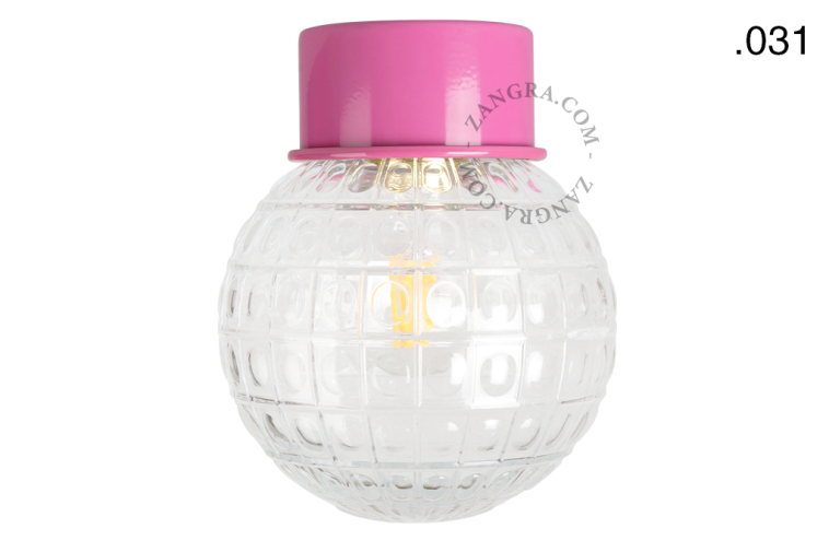 Pink ceiling light with glass shade.