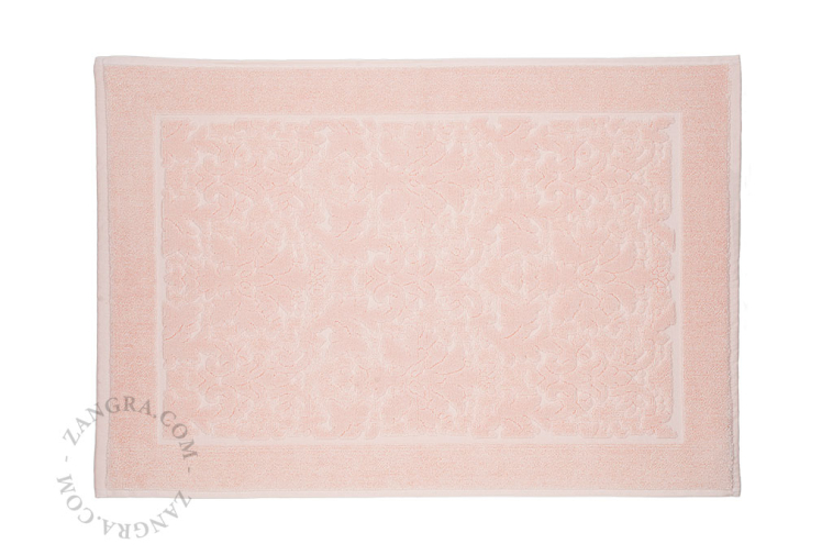 Light brown cotton bathroom mat.