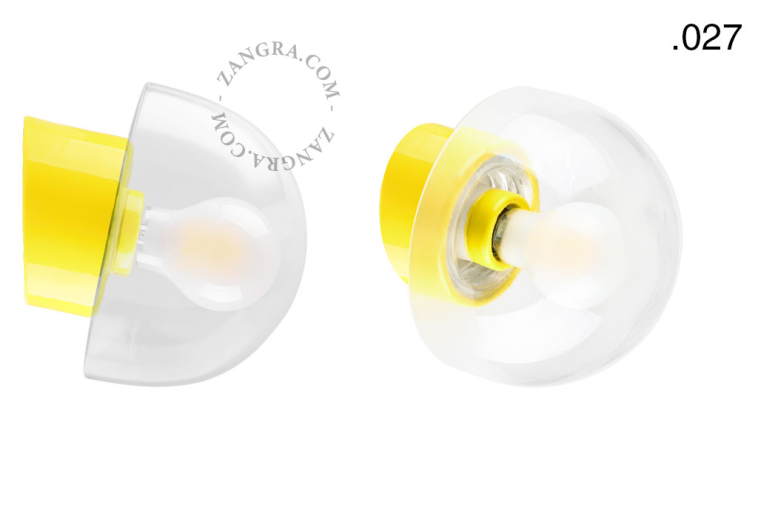 Yellow porcelain wall light with glass lampshade.