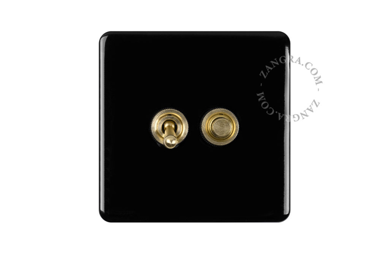 Black porcelain square-shaped switch.