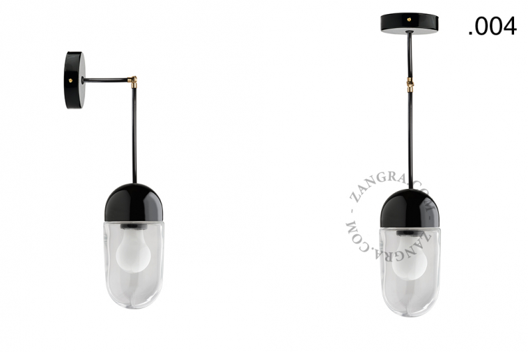 Black porcelain wall or ceiling light with glass shade.