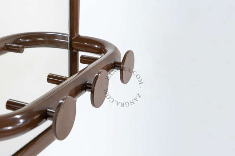 Retro mirror with three hooks.