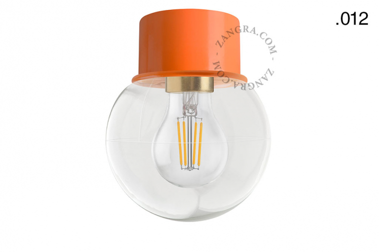 orange ceiling light with glass shade