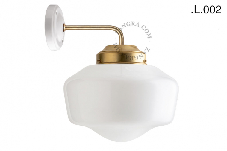 Brass retro wall light schoolhouse style with glass shade.