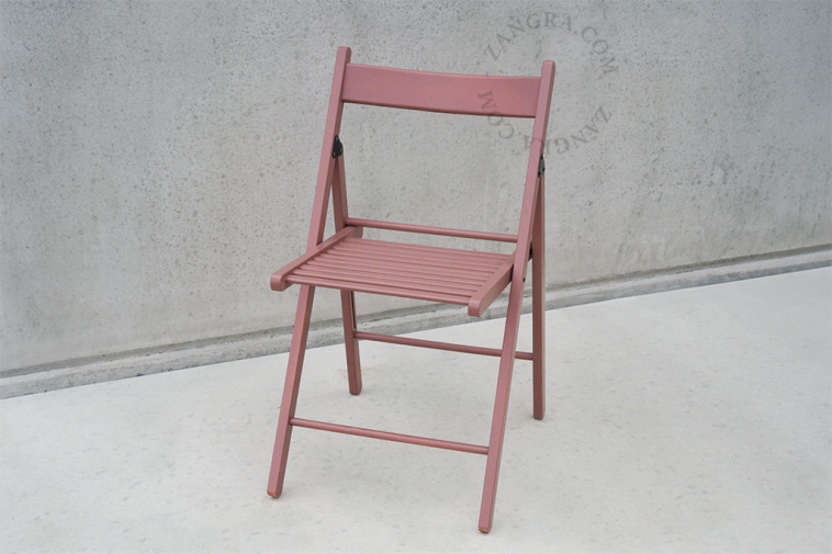 Wooden folding chairs.